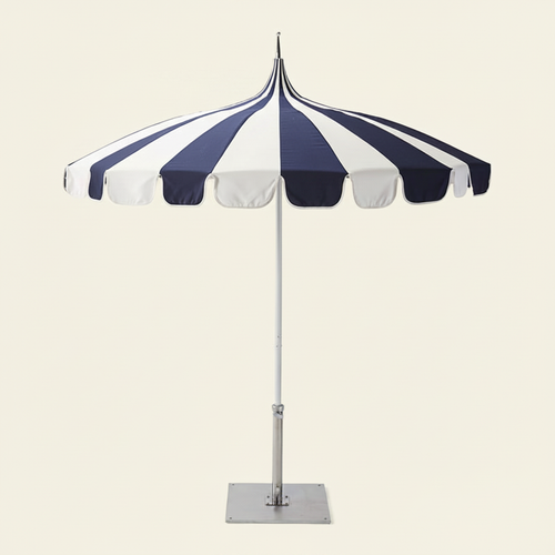 2.5M Riviera Luxe Outdoor Patio Umbrella in blue and white open over a patio setting